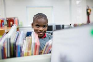 2013 SLLP peeking from books - website v.jpg